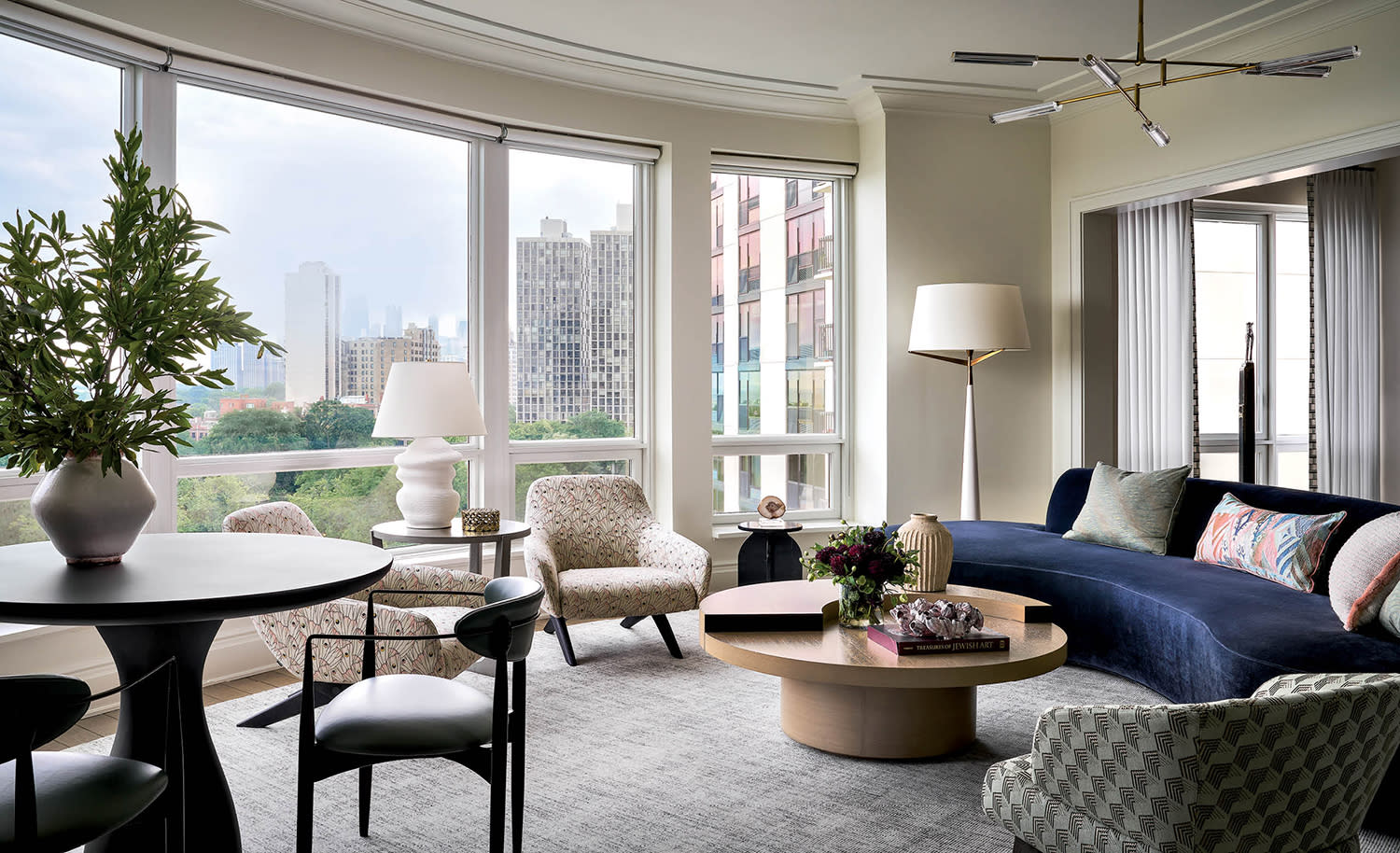 elegant living room with views of Chicago out the window